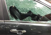 A Home Turned Battlefield: Husband shot dead while sitting in his parked car in his own garage