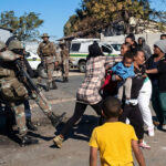 Shocking video goes viral: SANDF soldier recorded brutally slapping and kicking woman during drug raid (WATCH)