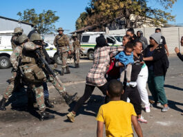 Shocking video goes viral: SANDF soldier recorded brutally slapping and kicking woman during drug raid (WATCH)