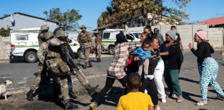Shocking video goes viral: SANDF soldier recorded brutally slapping and kicking woman during drug raid (WATCH)