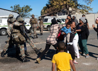 Shocking video goes viral: SANDF soldier recorded brutally slapping and kicking woman during drug raid (WATCH)