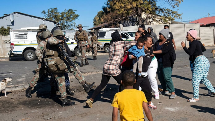 sandf soldier beating up woman in elsies river