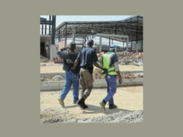 Workers Fled Over Walls As Officials Stormed Johannesburg Construction Site And Arrested 41 Undocumented Foreigners