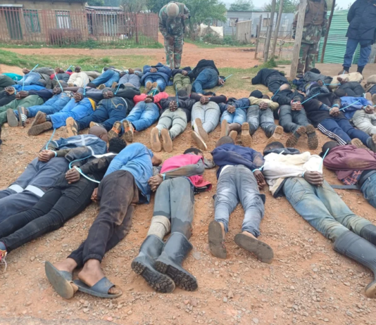 Helicopter crash-lands during major Fochville illegal-mining raid as 121 suspected miners are arrested and firearms seized