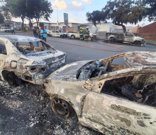 ‘We are tired of foreign nationals’: 24 vehicles torched in Soweto and Durban as protests over asylum ruling erupt into violence