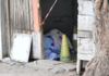 Gunmen chasing alleged gangster kill mother and neighbour in their own yard