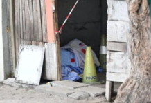 Gunmen chasing alleged gangster kill mother and neighbour in their own yard